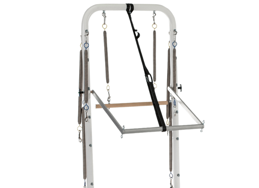 Balanced Body Tower with spring attachments and maple pole for Pilates.