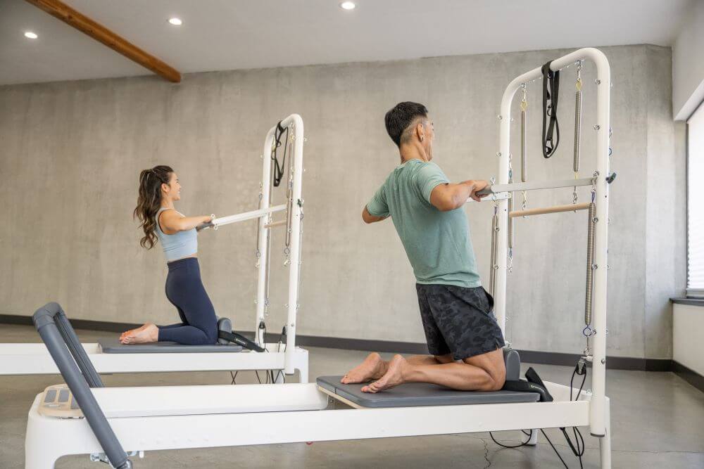 Pilates practitioners using Allegro 2 Tower of Power in studio.