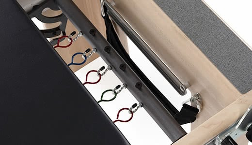 Balanced Body Pilates equipment featuring 6 Signature Springs System.