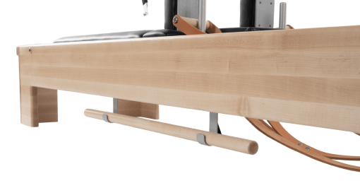 Pilates machine frame made of Strata Rock Maple with satin finish.