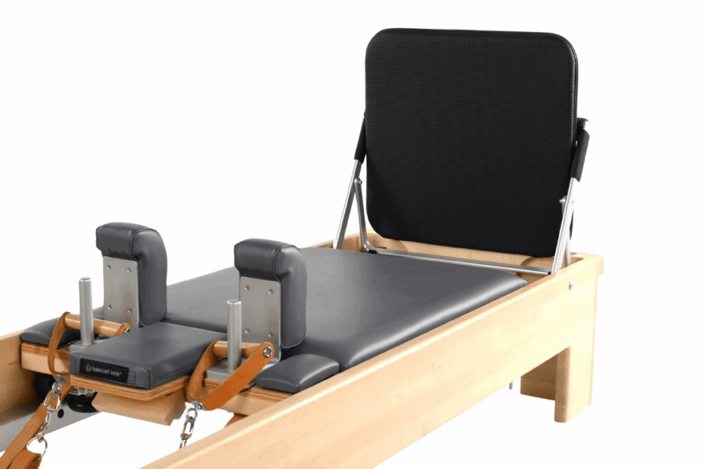 Balanced Body CenterLine Reformer Jumpboard, padded for support.