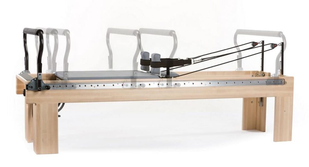 Balanced Body reformer with Infinity Footbar and spring system.