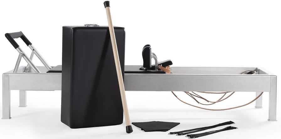 Pilates accessories: leather loops, maple exercise bar, kneeling pads, Sitting Box, foot and extender straps.