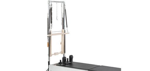 Professional Pilates Tower with wooden bar and Contrology Springs.
