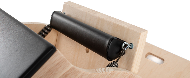 Pilates footstep with padded non-slip mushroom-shaped surface.
