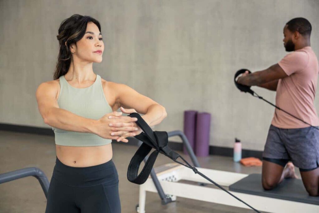 Pilates workout using Double Loops on a reformer.
