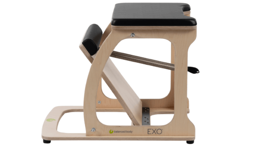 Balanced Body Pilates chair with stable maple wood frame and black seat