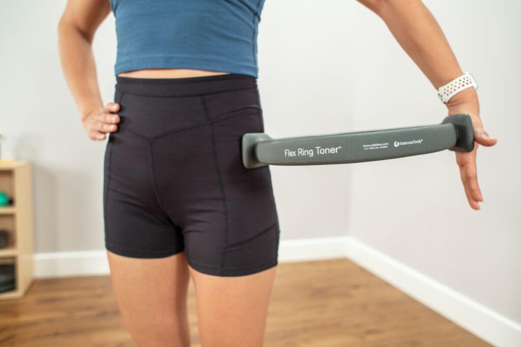 Person using Flex Ring Toner for Pilates exercise