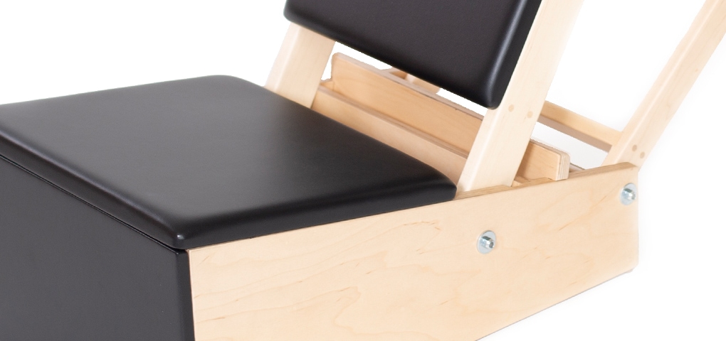 Maple wood Pilates chair with adjustable backrest and high-density foam.