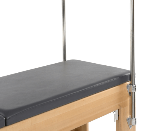 Professional twin mat for reformer with black upholstery shown.