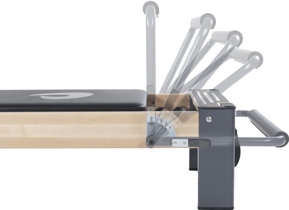 Pilates reformer footbar and spring system with adjustment options