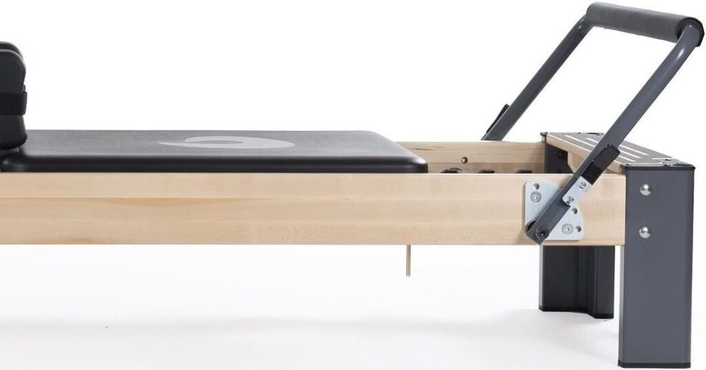 Stylish Pilates Reformer with maple frame and metal legs
