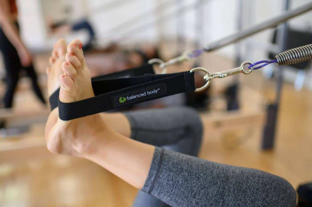 Close-up of Balanced Body Single Loops in use during Pilates.