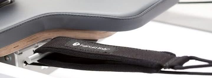 SoftTouch Rope System with Quick Adjustment Close-up of the SoftTouch Rope System on Pilates equipment for easy adjustments.