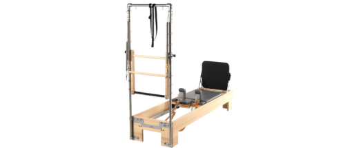 Pilates reformer with jumping board for enhanced training functions.