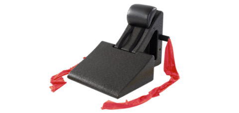 Lightweight high-density foam Pilates accessory with resistance band and pillow.