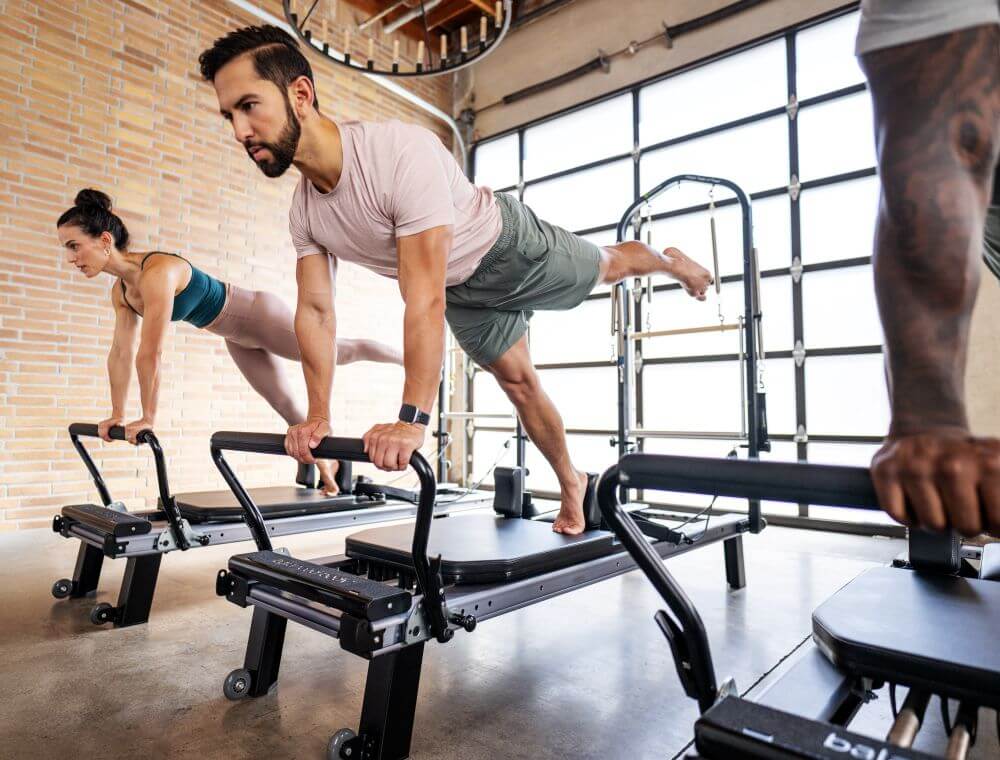 Pilates class using Allegro Nextgen Reformer with Tower.