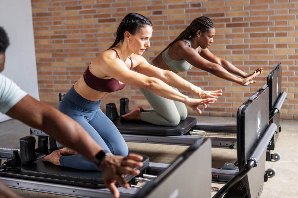 Pilates practitioners using Allegro NextGen Reformer Jumpboard.