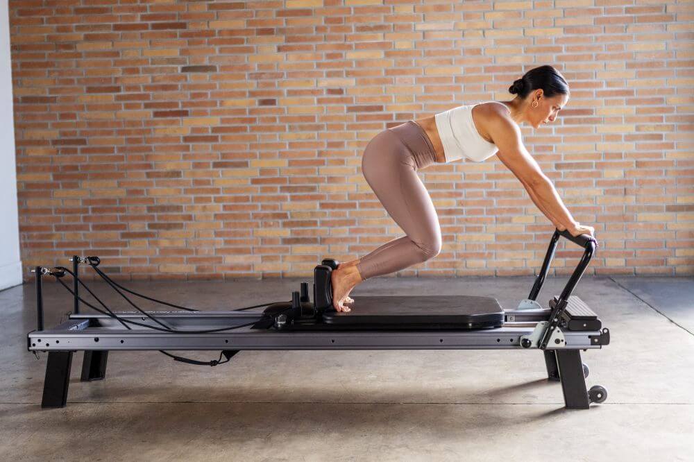 Allegro Nextgen Reformer in use at a Pilates studio.