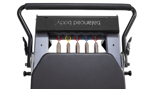 Balanced Body reformer with 5 Signature Springs for adjustable resistance.