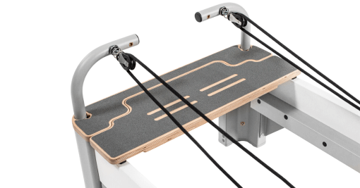 Balanced Body Reformer platform extension for diverse Pilates exercises.