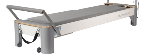 Removable dove mat on Reformer platform for stability and comfort.