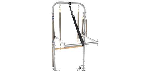 Tower with multiple springs and wooden bars for Pilates exercises